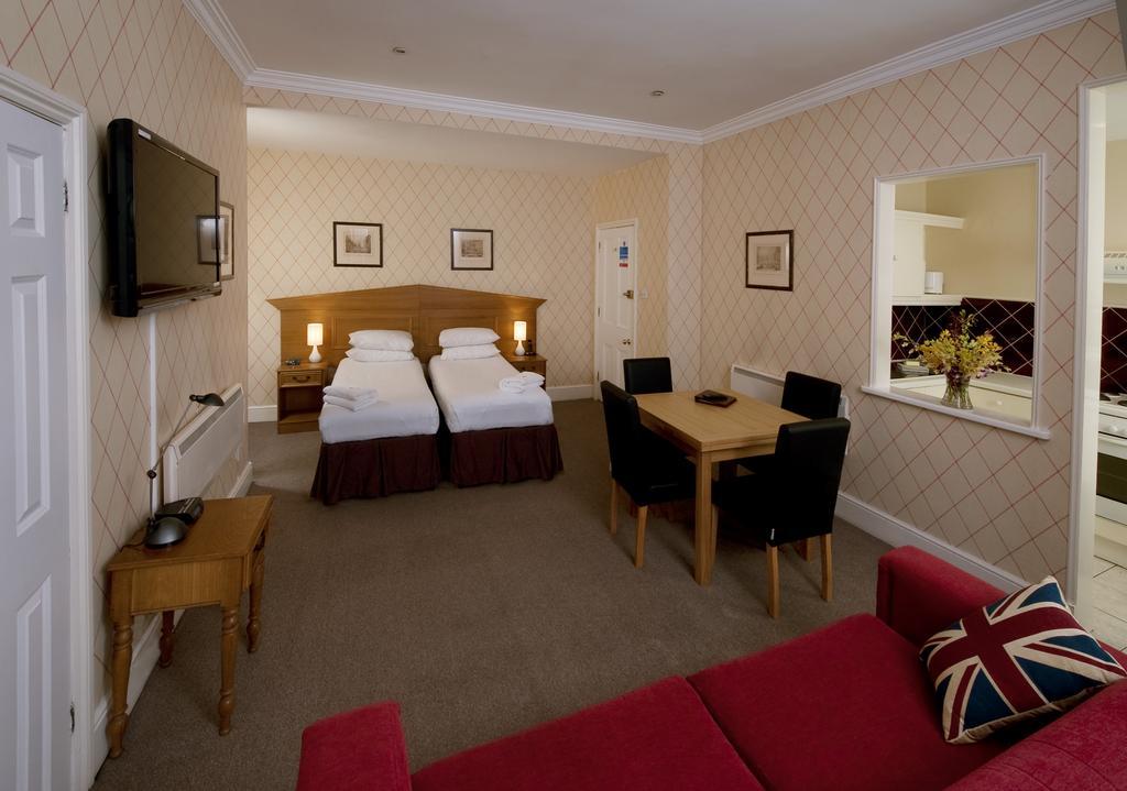 Astons Apartments Londra Oda fotoğraf