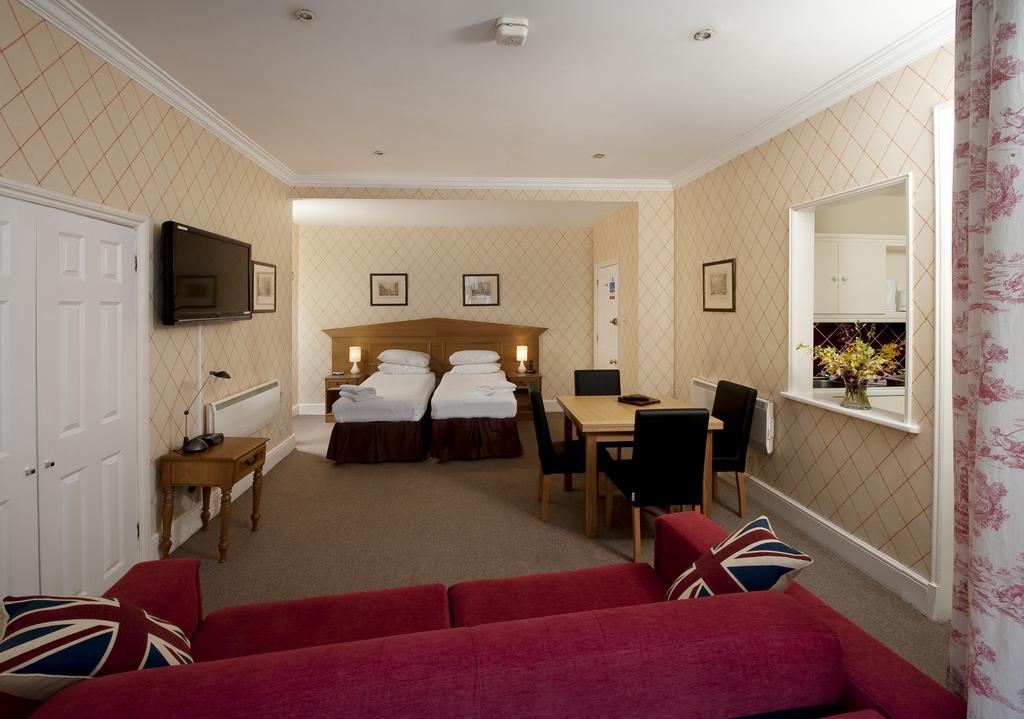 Astons Apartments Londra Oda fotoğraf